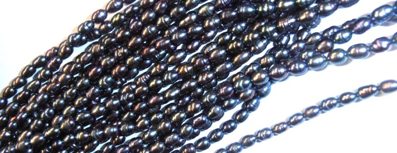 Cultured Freshwater Pearls are never naturally black, grey or "peacock." These cultured freshwater pearls have been irradiated to give them a faux "Tahitian" look.