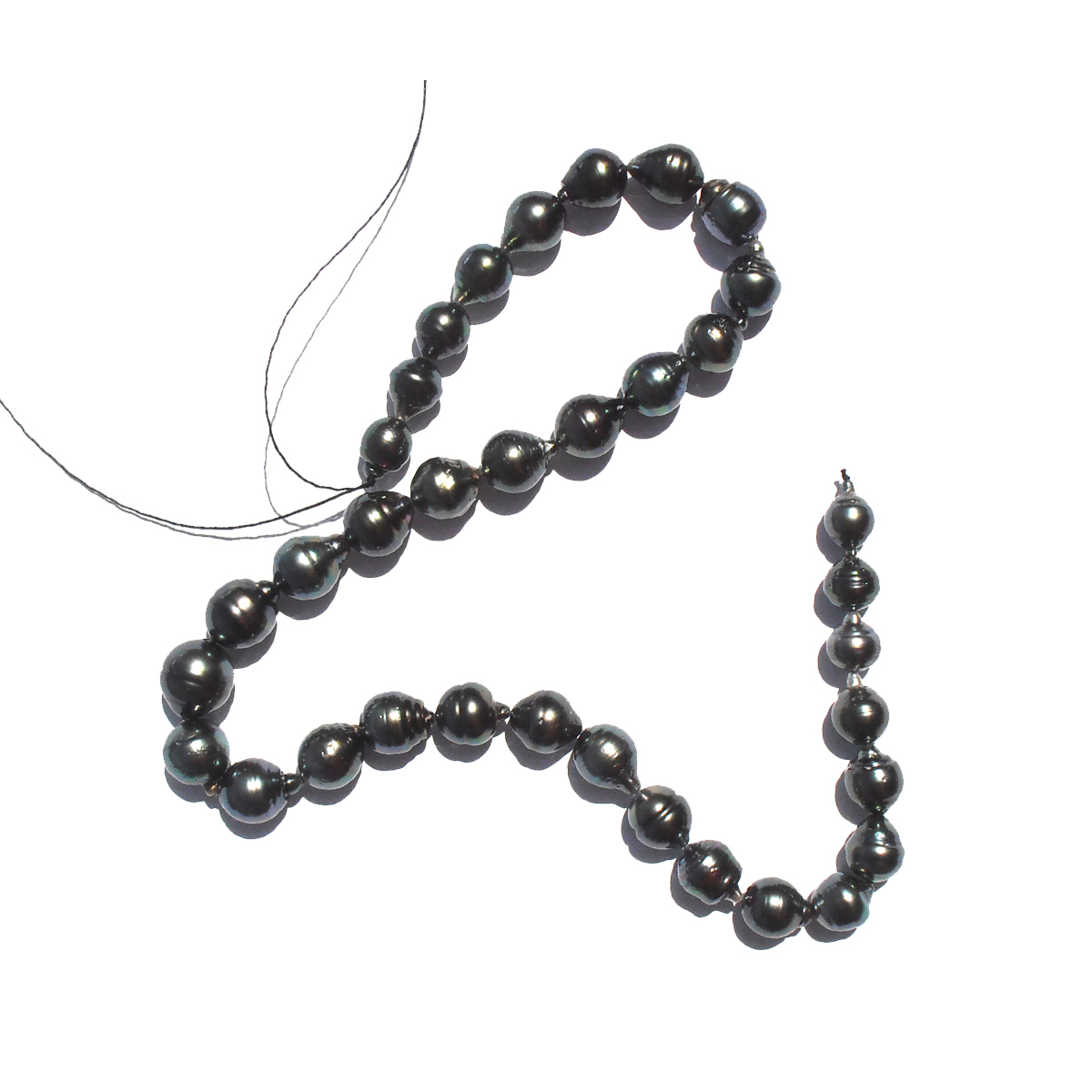Loose-strung cultured semi-graduated 11-8mm Baroque Tahitian Pearls. Natural dark hues and soft greenish overtones. $750.-USD
