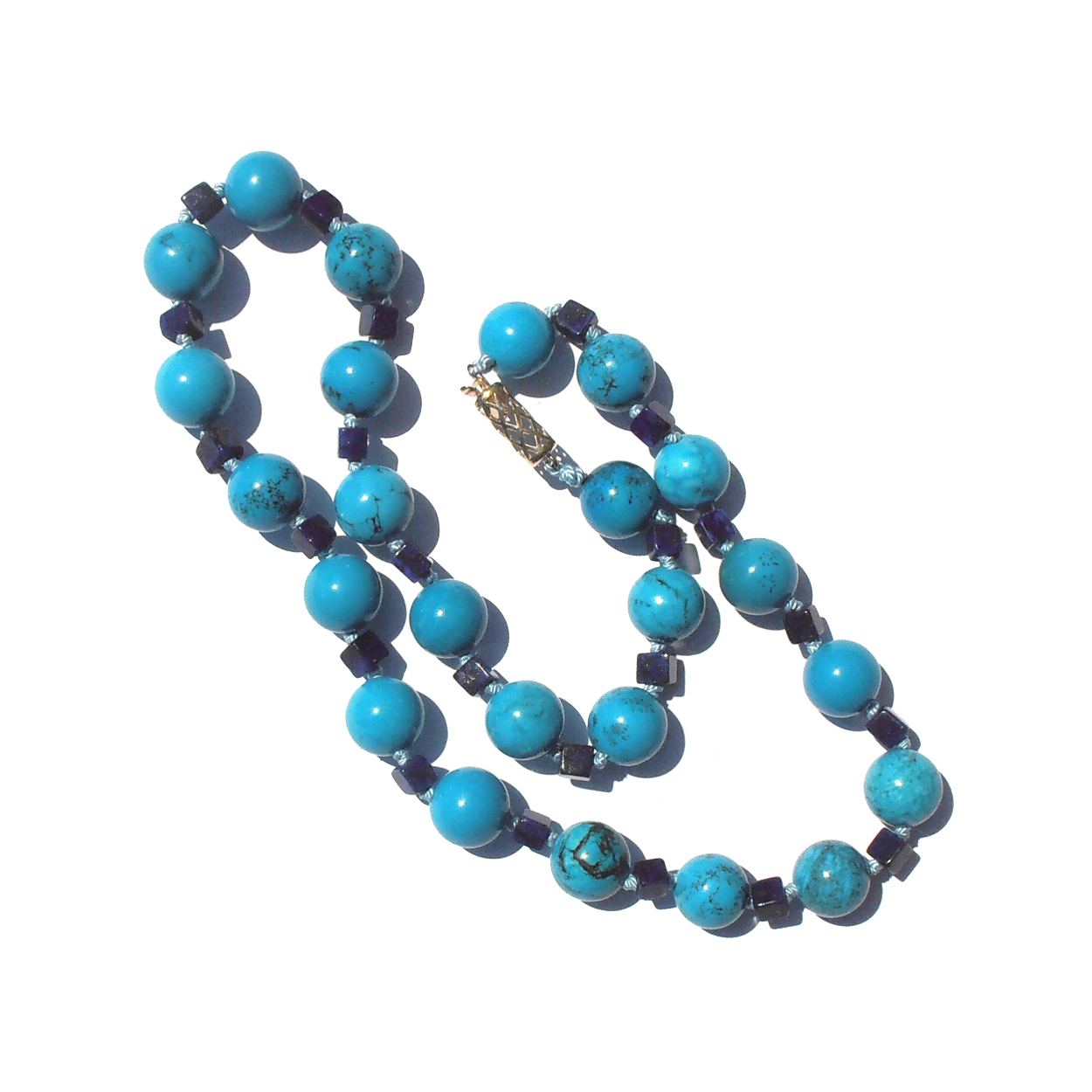 Royal Beauty Turquoise & Lapis Lazuli one-of-a-kind necklace. A classic 16" length. Handknotted on silk with a 14k gold clasp. $505.-USD